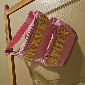 Matching "Travel" and "stuff" fanny packs NWOT